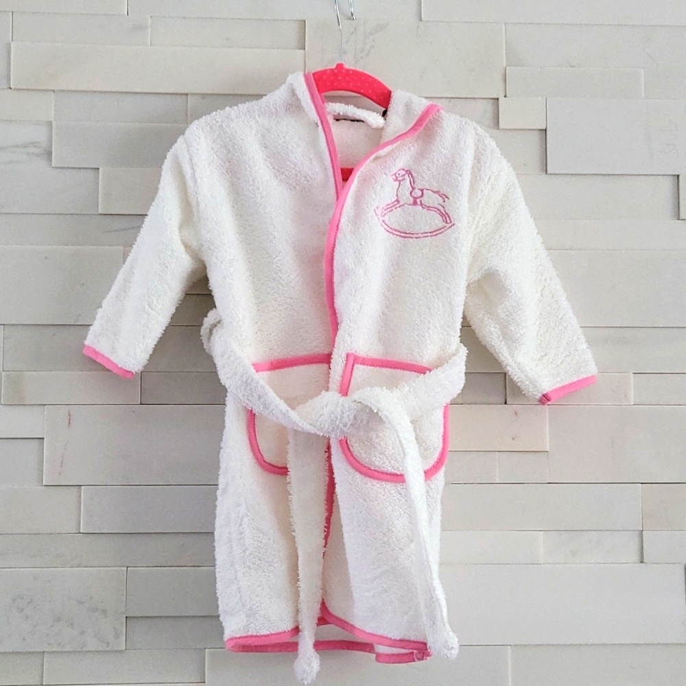PEACOCK ALLEY TODDLER BATHROBE SIZE 12-18 M, WHITE AND PINK WITH ROCKING HORSE